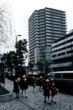 Children from the same neighborhood often head to school in a group.