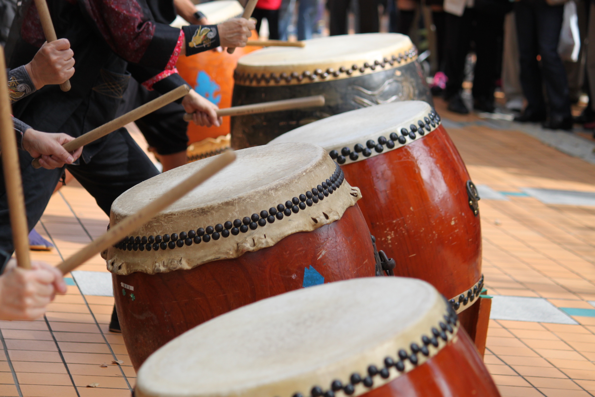 Children perform on the wadaiko, or Japanese drums.