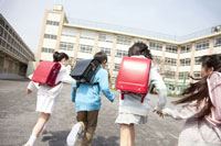 Children from the same neighborhood often head to school in a group.