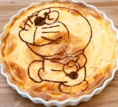 The third-floor cafe has a menu with a number of unique dishes. Pictured here is a rice casserole with white sauce, topped with an image of Doraemon.