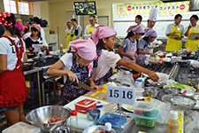 Team of elementary school kids competing in making a Happy Meal 