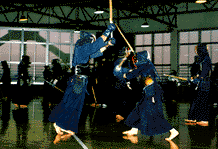 Practicing kendo, a form of Japanese fencing.