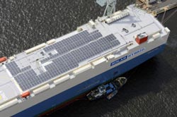 The Emerald Ace, a car carrier, with 768 solar panels installed on the deck.