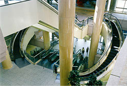 Two spiral escalators placed symmetrically in Yokohama Landmark Plaza