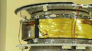 The polyimide sail wrapped around the main body of IKAROS. (Photo courtesy of JAXA) 