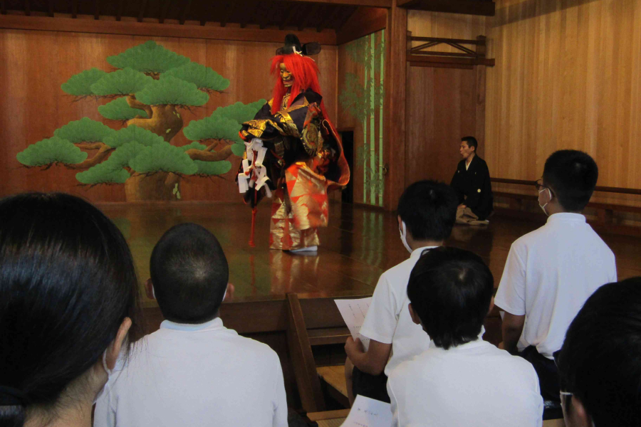 Students watching a Noh performance at Kashokaku, a Noh theater in Kyoto.