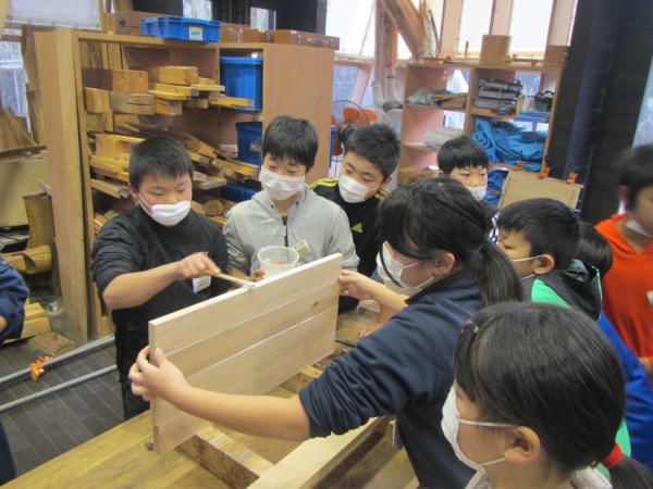 Sixth-year students working on desktops