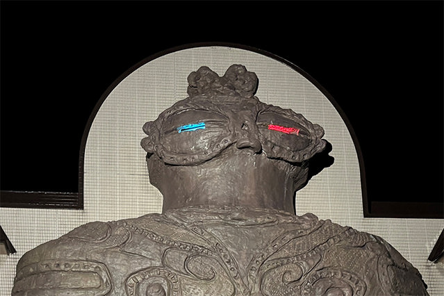 Close-up of Shako-chan, the local mascot of Kizukuri, with illuminated eyes at night