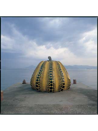 Outdoor art at Benesse House, with the Seto Inland Sea in the background. (C)Yayoi Kusama 