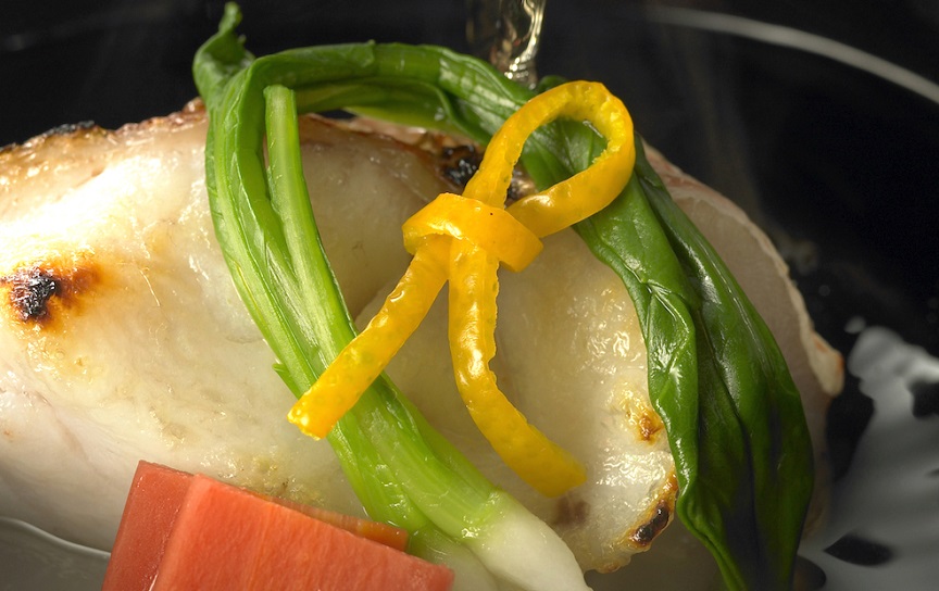 Dish with thinly sliced and tied yuzu (Tsuji Culinary Institute)