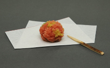 Careful attention is paid to the seasonal nature of the sweet delicacies provided. Underneath the sweet delicacy is the white paper Kaishi and to the front-right is the Yoji