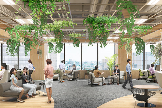 Open-plan office interior with abundant wooden finishes, hanging plants, and seating areas where people work and socialize