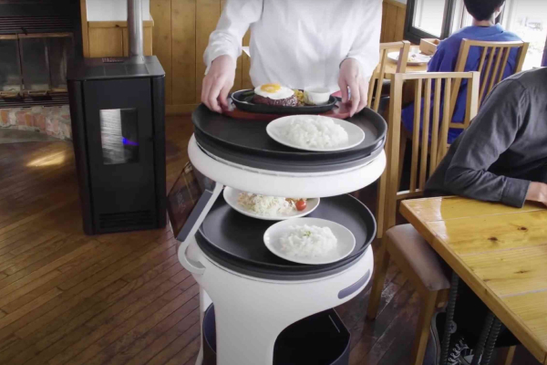 You can take dishes from the top tray at any angle.