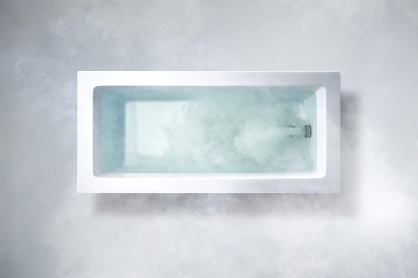 Concept image of a microbubble bathtub. Water filled with ultrafine bubbles remains clear, while water enriched with microbubbles becomes milky.